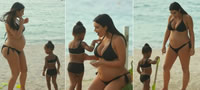 kim-kardashian-i-nort-vest-vo-crni-bikini-na-plaza-vo-sent-barts-foto-povekje.jpg