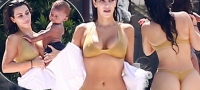 kim-kardashijan-vo-zlatno-tanga-bikini-na-bazen-so-decata-01 copy-povekje