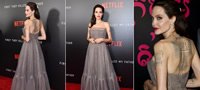 angelina-jolie-ja-otkri-masivnata-tetovaza-vo-fustan-so-gol-grb-na-premiera-vo-ny-povekje.jpg