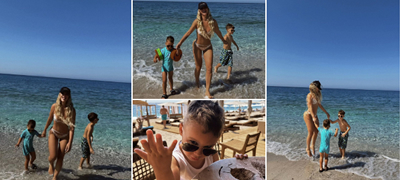 tuna-sejdiu-zgodna-vo-bikini-se-zabavuva-na-plazha-vo-albanija-so-sinovite-poveke-01.jpg