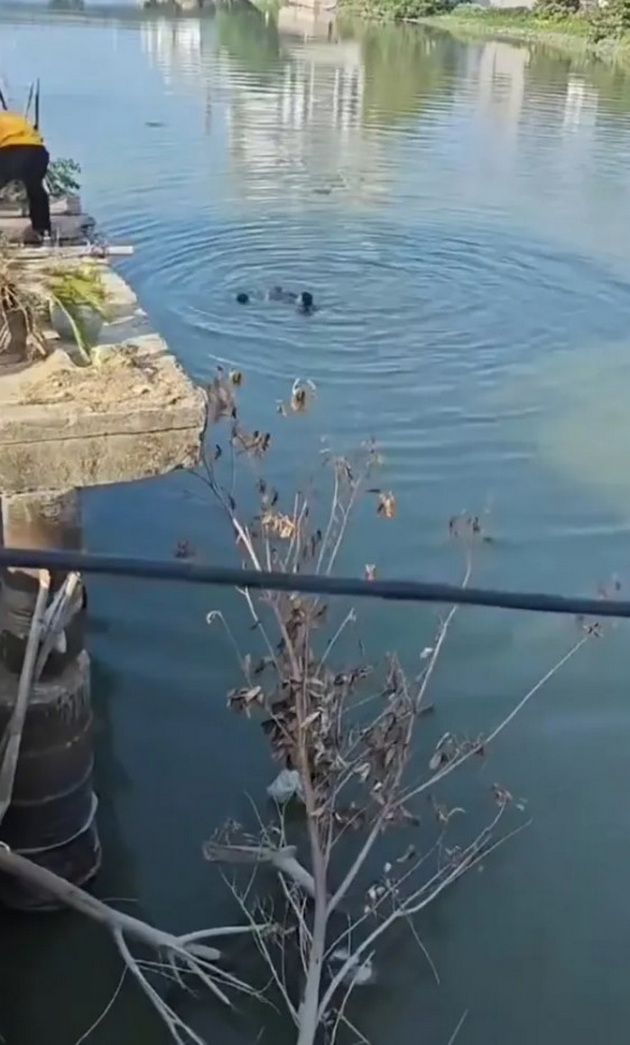 voznemiruvachko-video-tatko-si-go-frli-deteto-vo-reka-srede-zhestoka-raspravija-so-soprugata-05.jpg